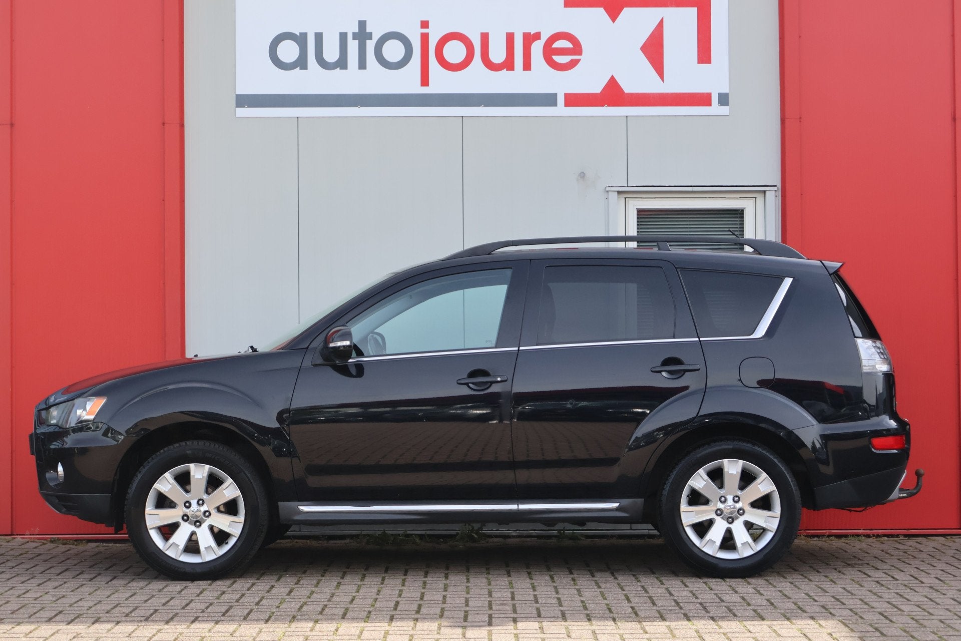 Mitsubishi Outlander 2.0 Intro Edition (bj 2011, automaat), Auto's, Stof, Zwart, 4 cilinders, Zwart