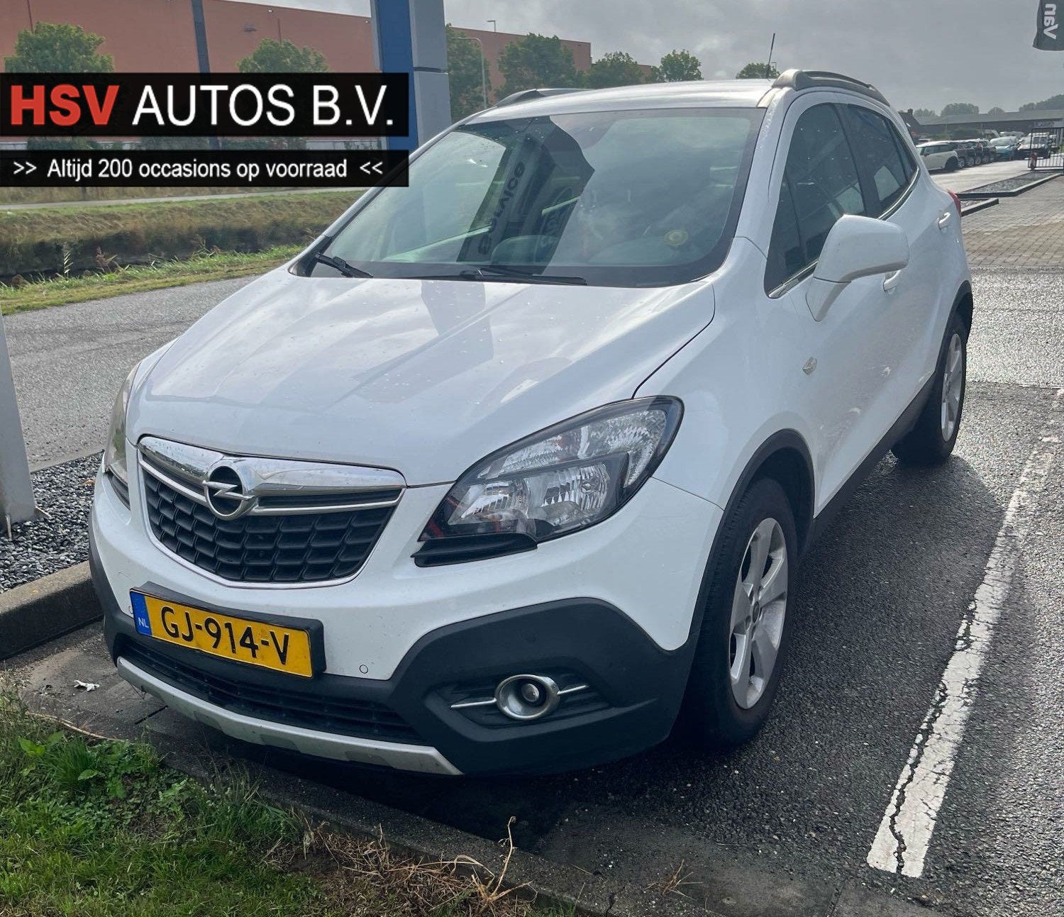Opel Mokka 1.4 T Cosmo LPG navi 1/2 Leer airco org NL, Auto's, Voorwielaandrijving, Gebruikt, Euro 6, Wit