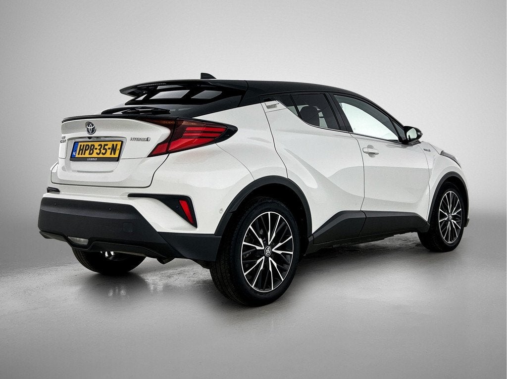 Toyota C-HR 1.8 Hybrid Executive | Apple Carplay/Android Aut, Auto's, Toyota, 12 maanden, 4 cilinders, Leder en Stof, Bedrijf