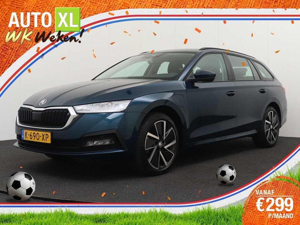 Skoda Octavia Combi 1.4 TSI iV PHEV Business Sport Trekhaak, Auto's, Skoda, Stof, Gebruikt, Blauw, 75 km