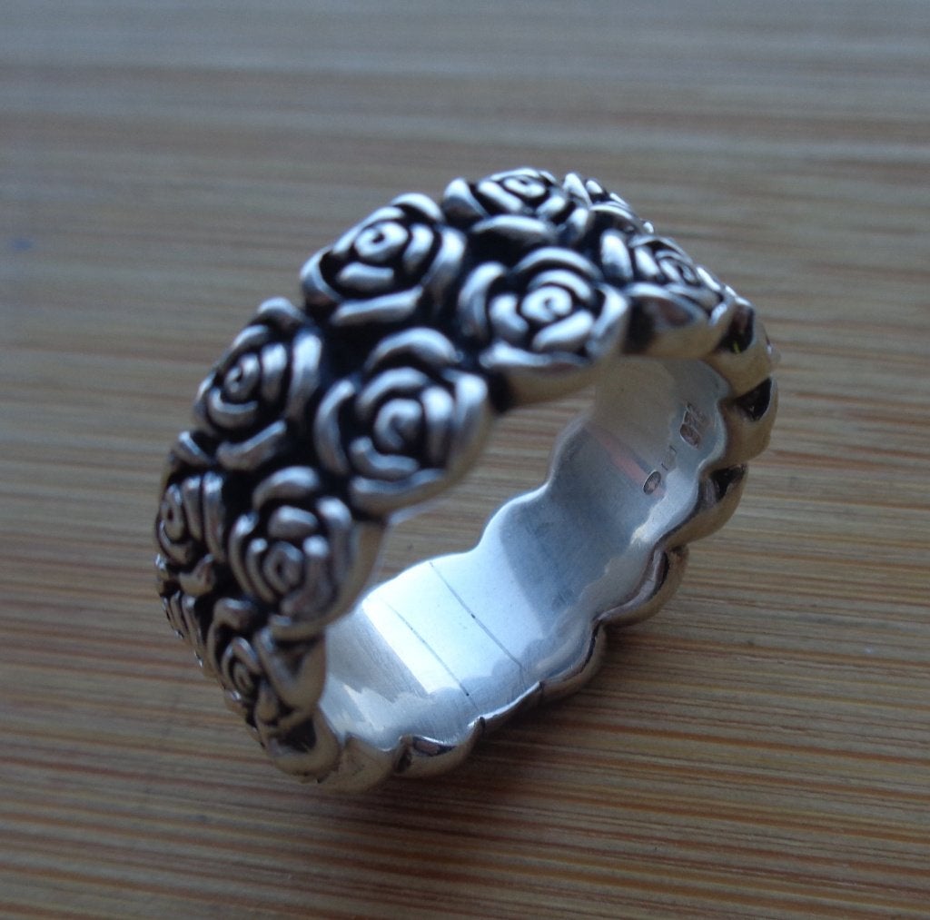 zilveren zware dames of heren ring met rozen [375], 20 of groter, Verzenden, Zo goed als nieuw, Dame