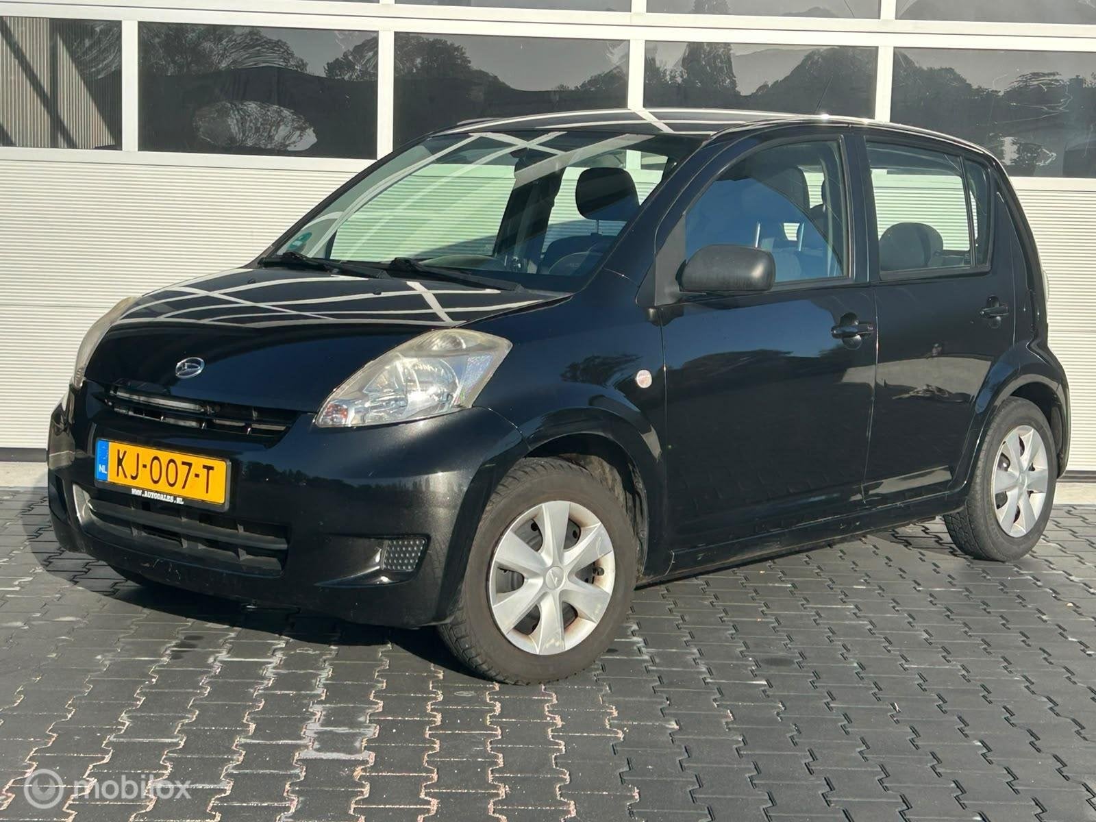 Daihatsu Sirion 2 1.0-12V Airco trekhaak, Auto's, Voorwielaandrijving, Gebruikt, Zwart, Sirion