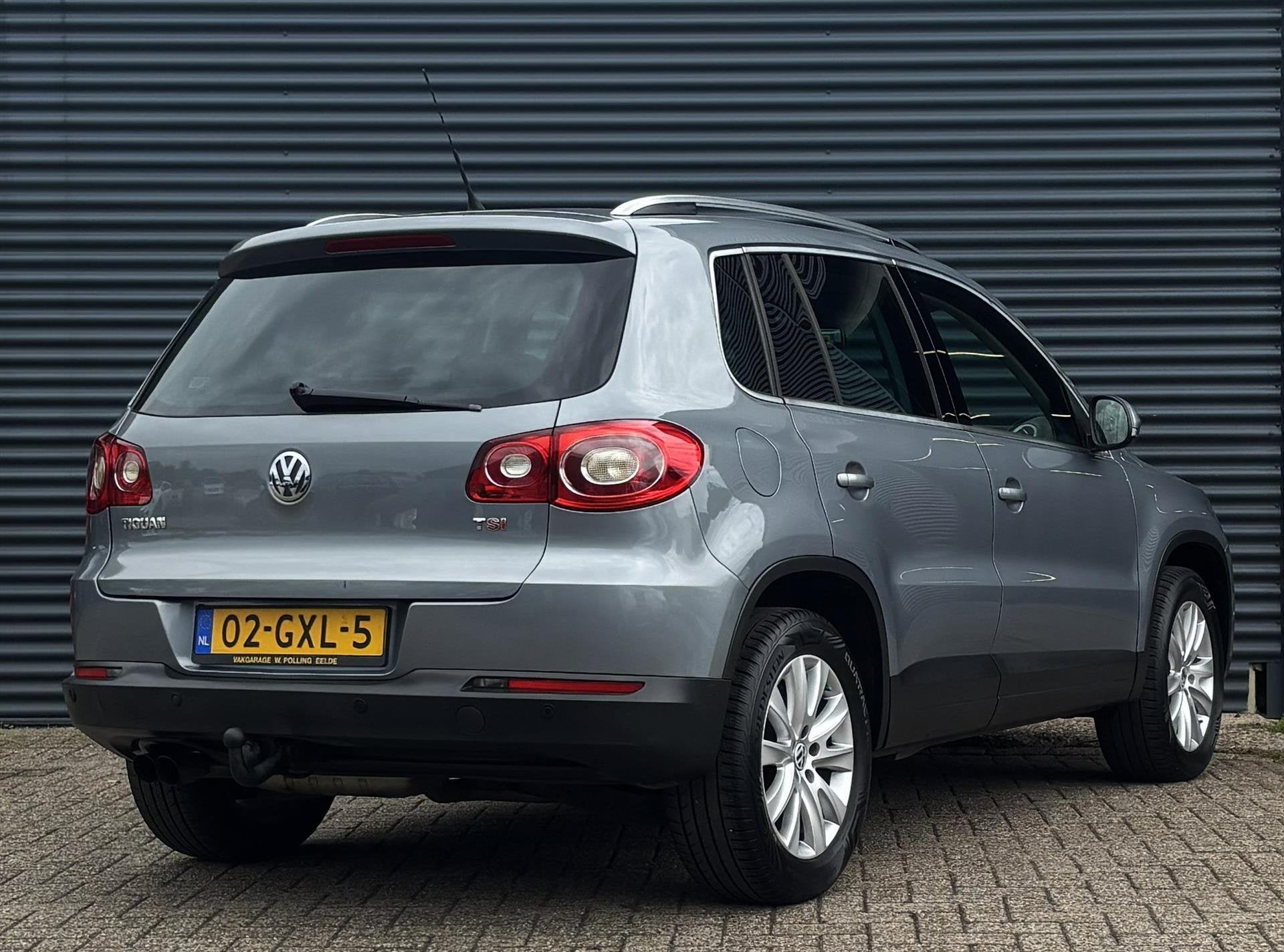Volkswagen Tiguan 1.4 TSI 150PK 4MOTION, Auto's, Stof, Gebruikt, Zwart, 4 cilinders