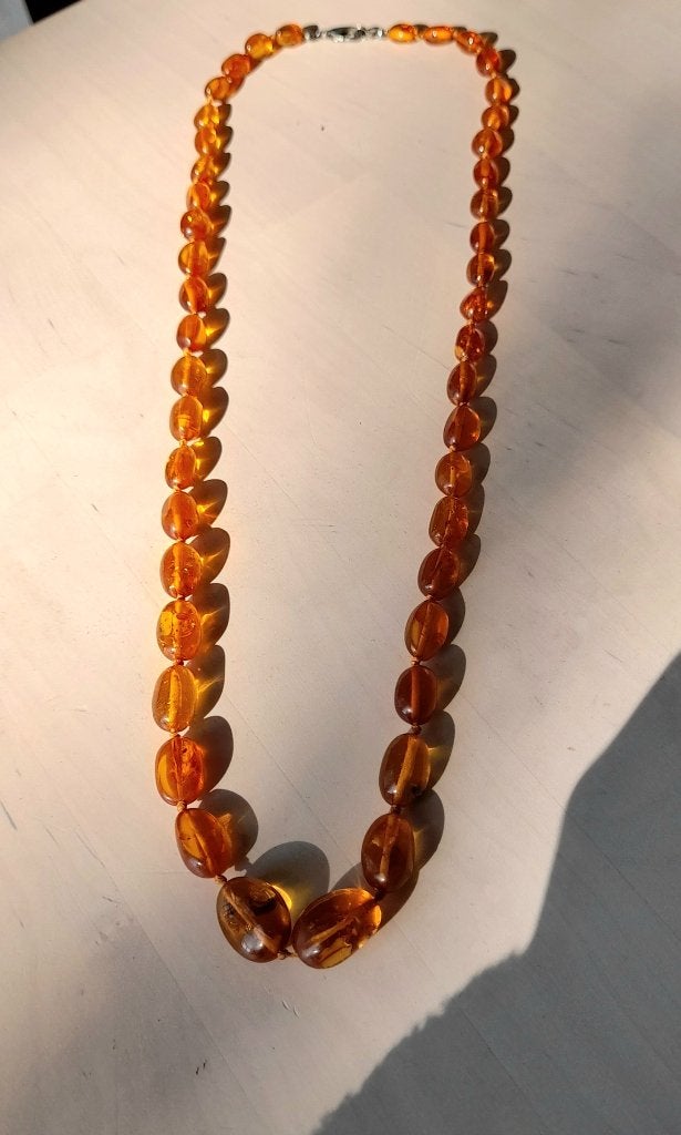 Mooie ketting met gepolijste barnsteen., Sieraden, Tassen en Uiterlijk, Kettingen, Ophalen of Verzenden, Zo goed als nieuw, Bruin