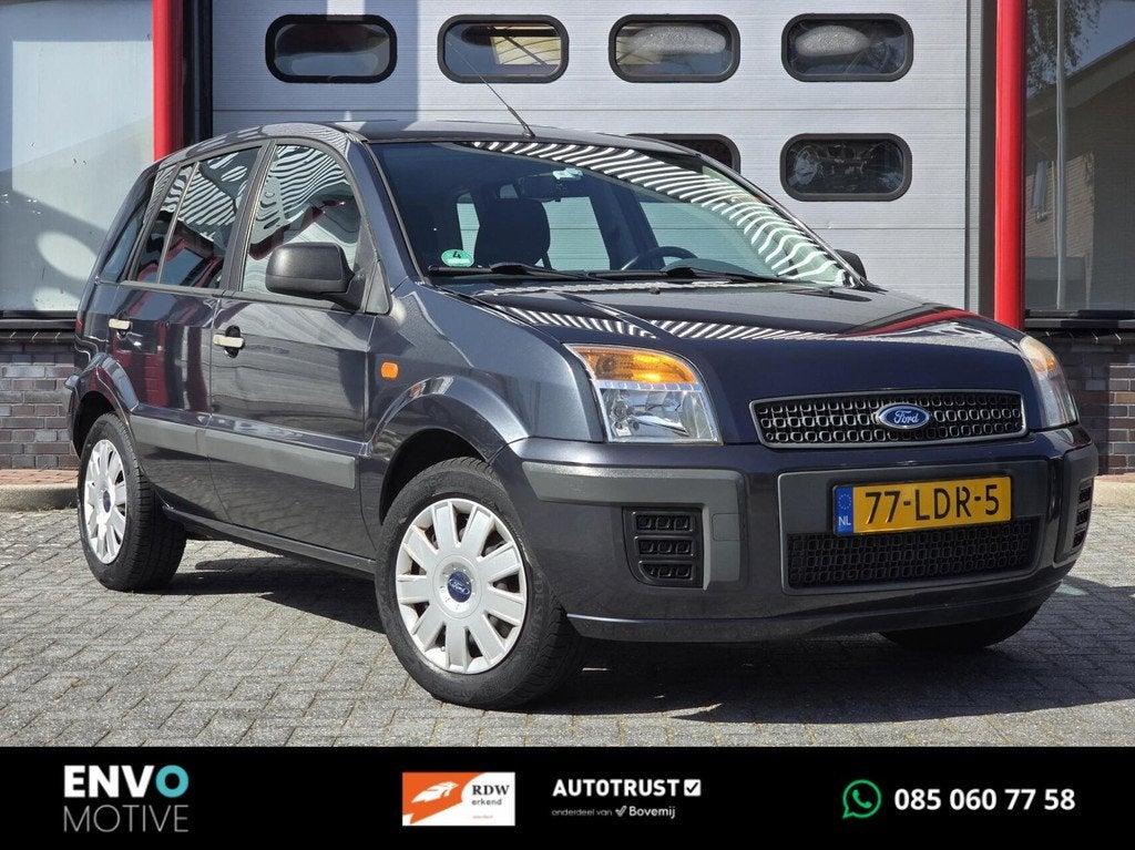Ford Fusion 1.4-16V Cool & Sound Airco/Trekhaak/AUX, Auto's, Ford, Voorwielaandrijving, Gebruikt, Zwart, Elektrische ramen