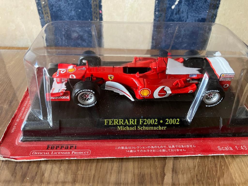 39944: Ferrari F2002 - Michael Schumacher - 2002 - Atlas, Hobby en Vrije tijd, Modelauto's | 1:43, Overige merken, C/ Segorbe 37 – 03206 – Elche – Alicante