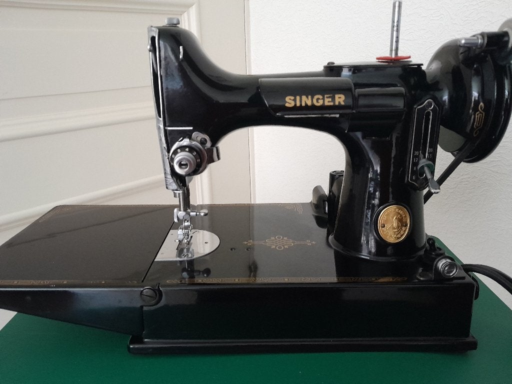 Singer Featherweight 221, Ophalen