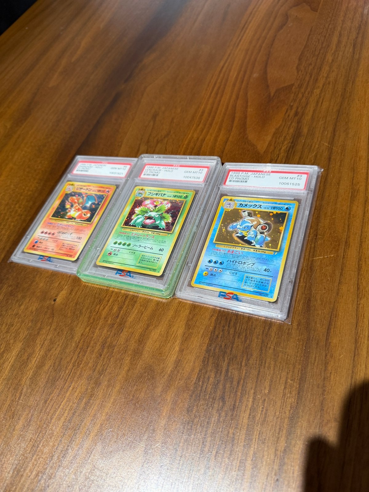 PSA 10 | Charizard Blastoise Venusaur | CD Promo Japans, Ophalen of Verzenden, Zo goed als nieuw, Meerdere kaarten