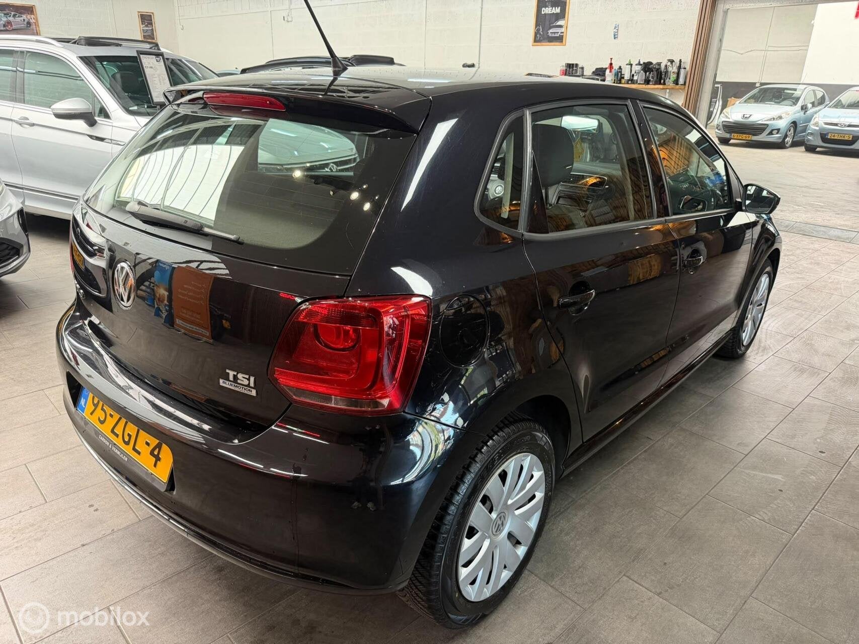 Volkswagen Polo 1.2 TSI BlueMotion Trendline/ Cruise C/ Nap, Voorwielaandrijving, Euro 5, 4 cilinders, Zwart