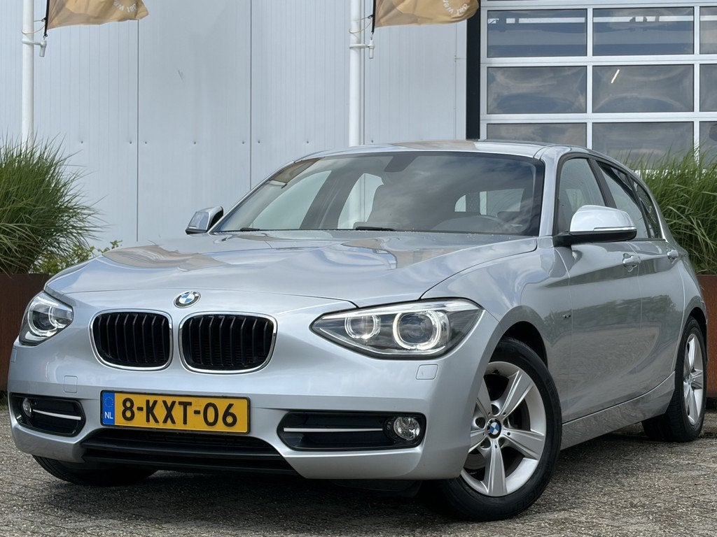 BMW 1-serie 114i EDE Business Sport 100pk | Airco automatisc, 1-Serie, Gebruikt, 4 cilinders, 19 km/l