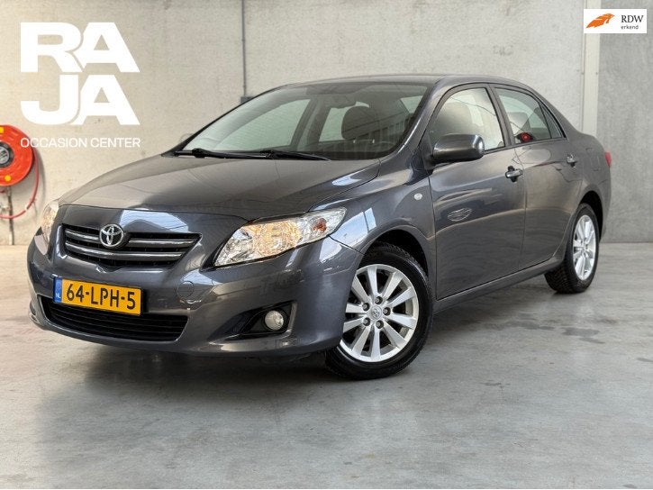 Toyota Corolla 1.6-16V Sol Automaat Navi Cruise Clima Keyles, Auto's, Toyota, Gebruikt, 4 cilinders, Corolla, Grijs