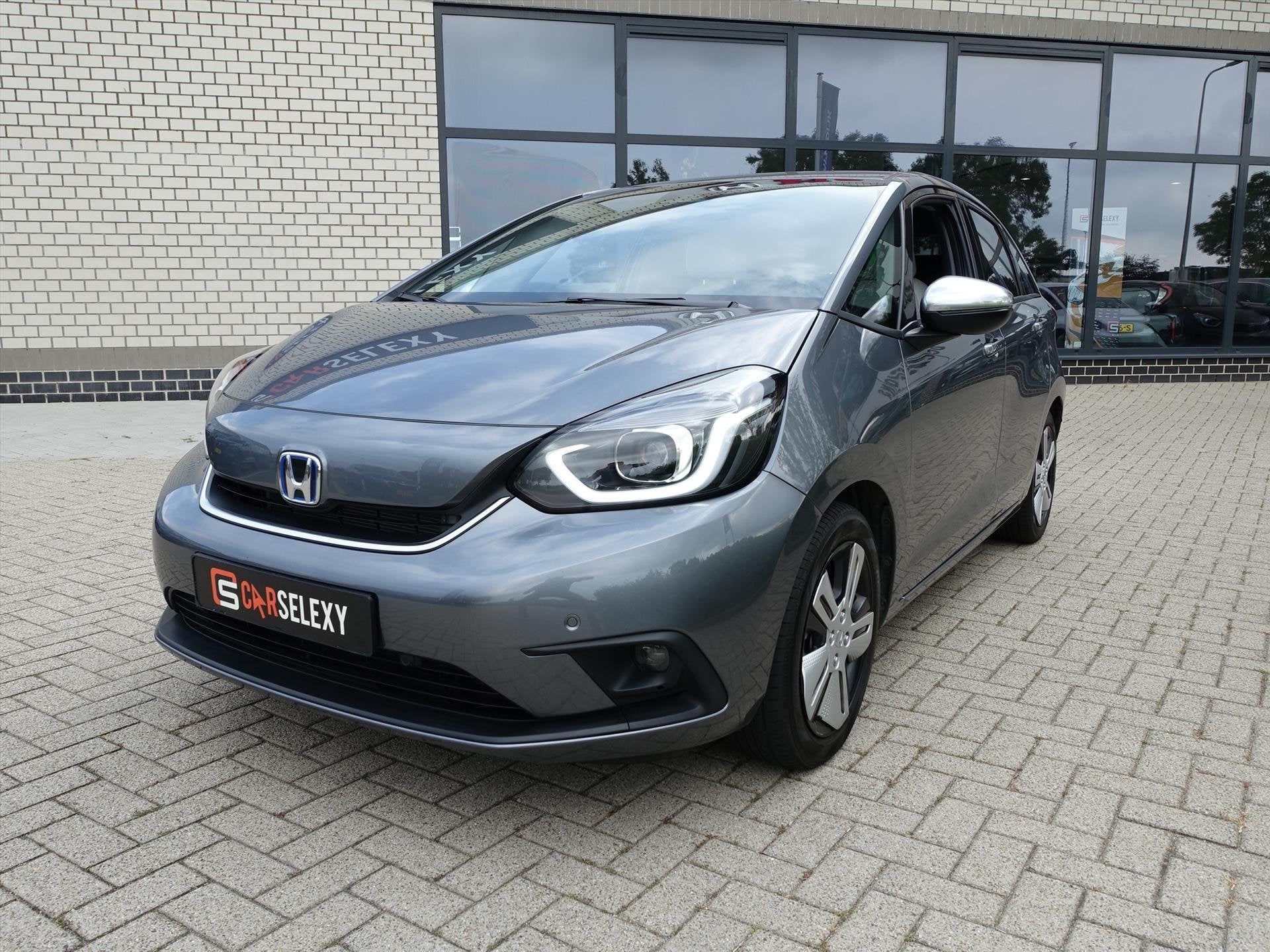HONDA Jazz 1.5 i-MMD 109pk Hybrid CVT Executive Nieuwstaat 1, Auto's, Automaat, Stof, Euro 6, 98 pk