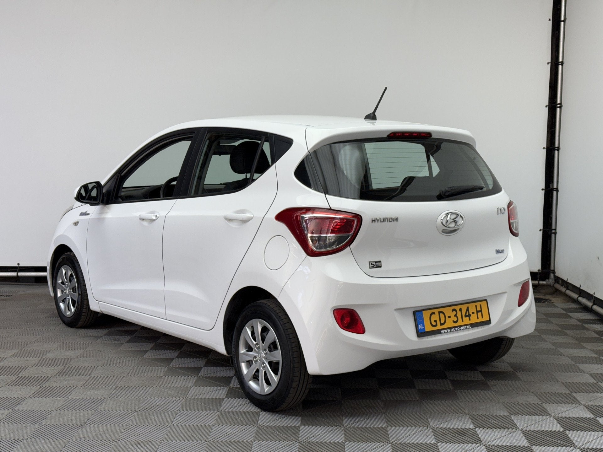 Hyundai i10 1.0i i-Motion Comfort ECC Cruise 1e Eigenaar NL, Auto's, Voorwielaandrijving, Euro 5, Stof, Gebruikt