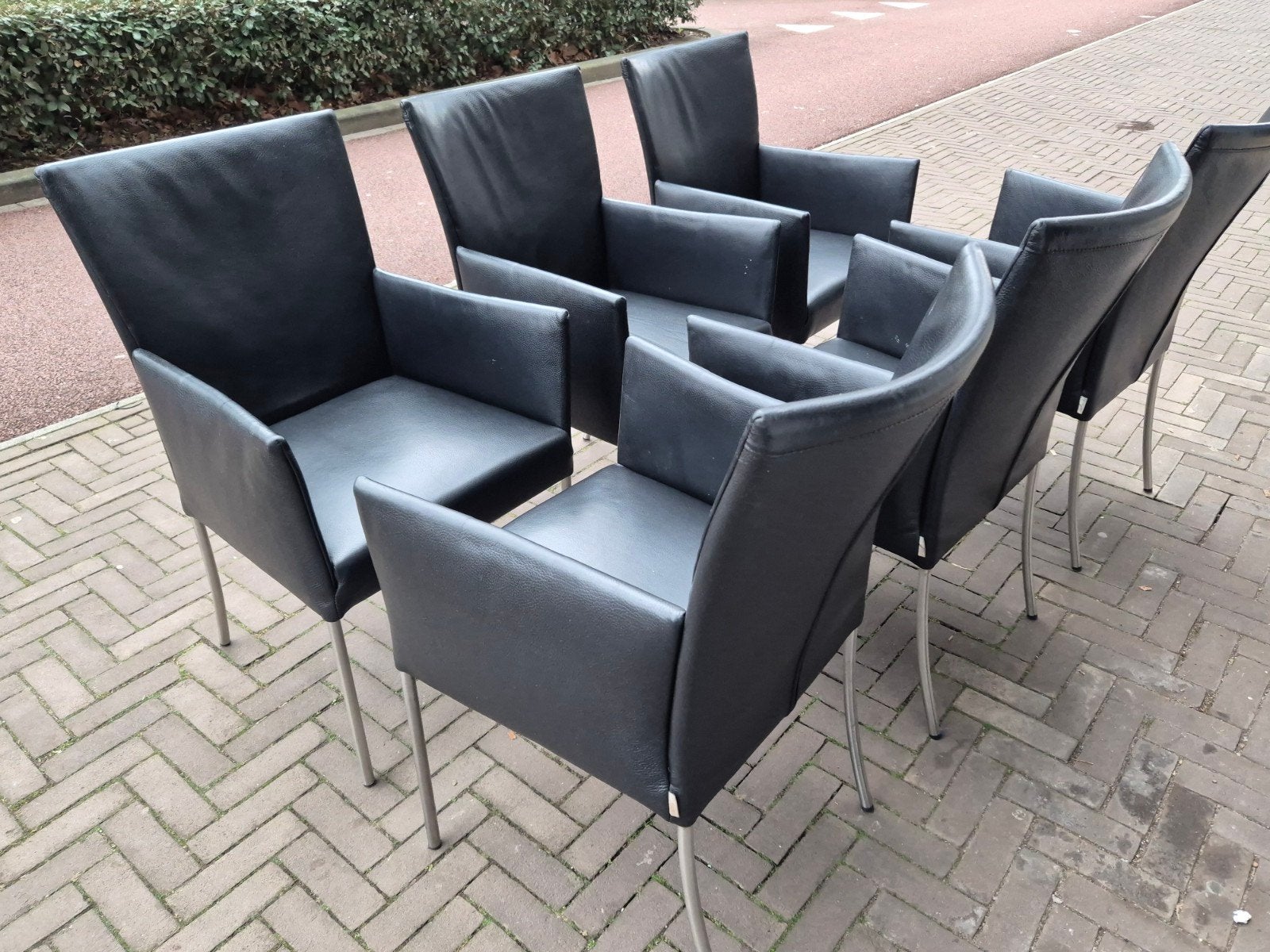 6 Bert plantagie design eetkamerstoelen Arc zwart leer rvs, Huis en Inrichting, Ophalen, Gebruikt, Modern design stijl, Zwart