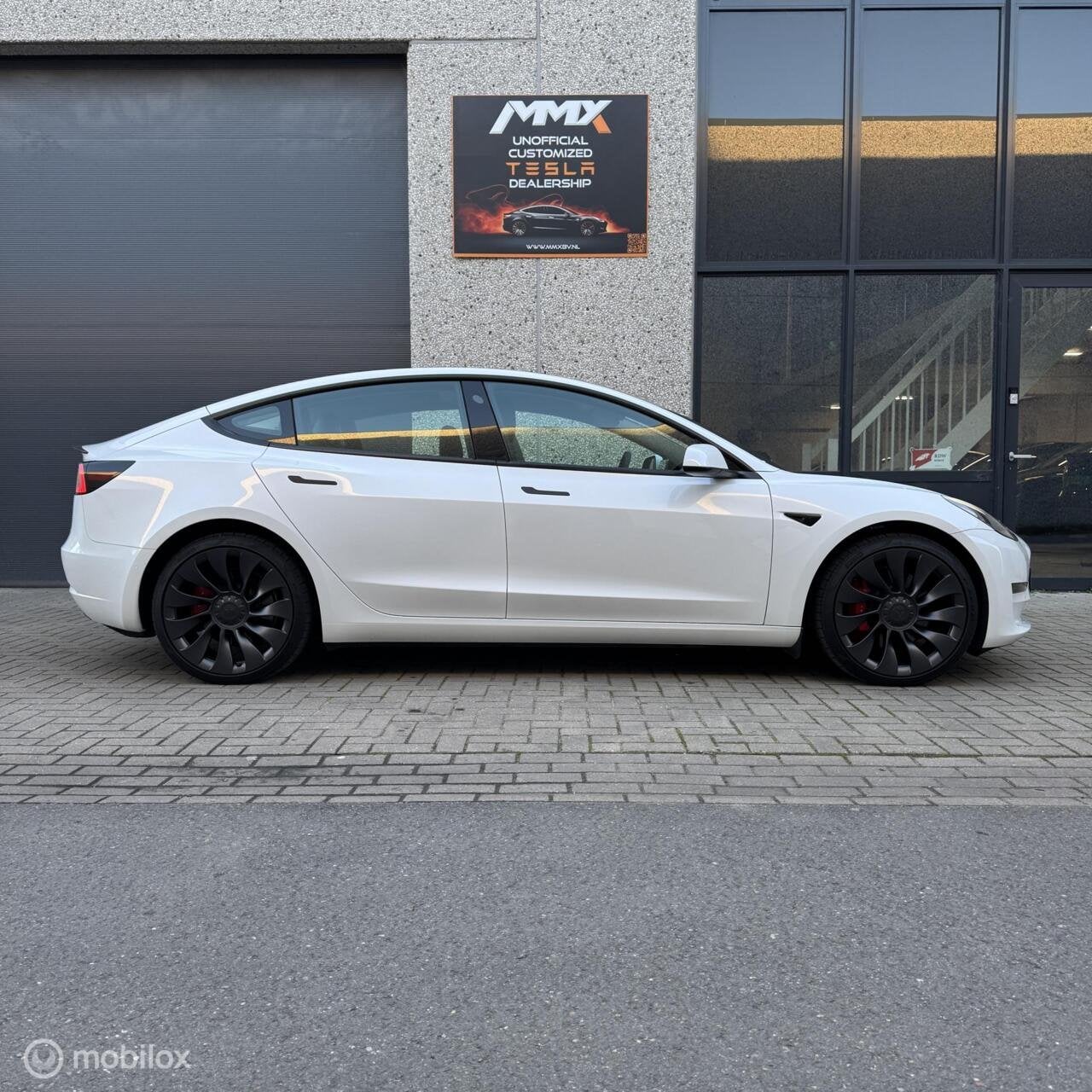 Tesla Model 3 Performance + MMX Pack + IAP, Auto's, Automaat, Gebruikt, Zwart, Wit