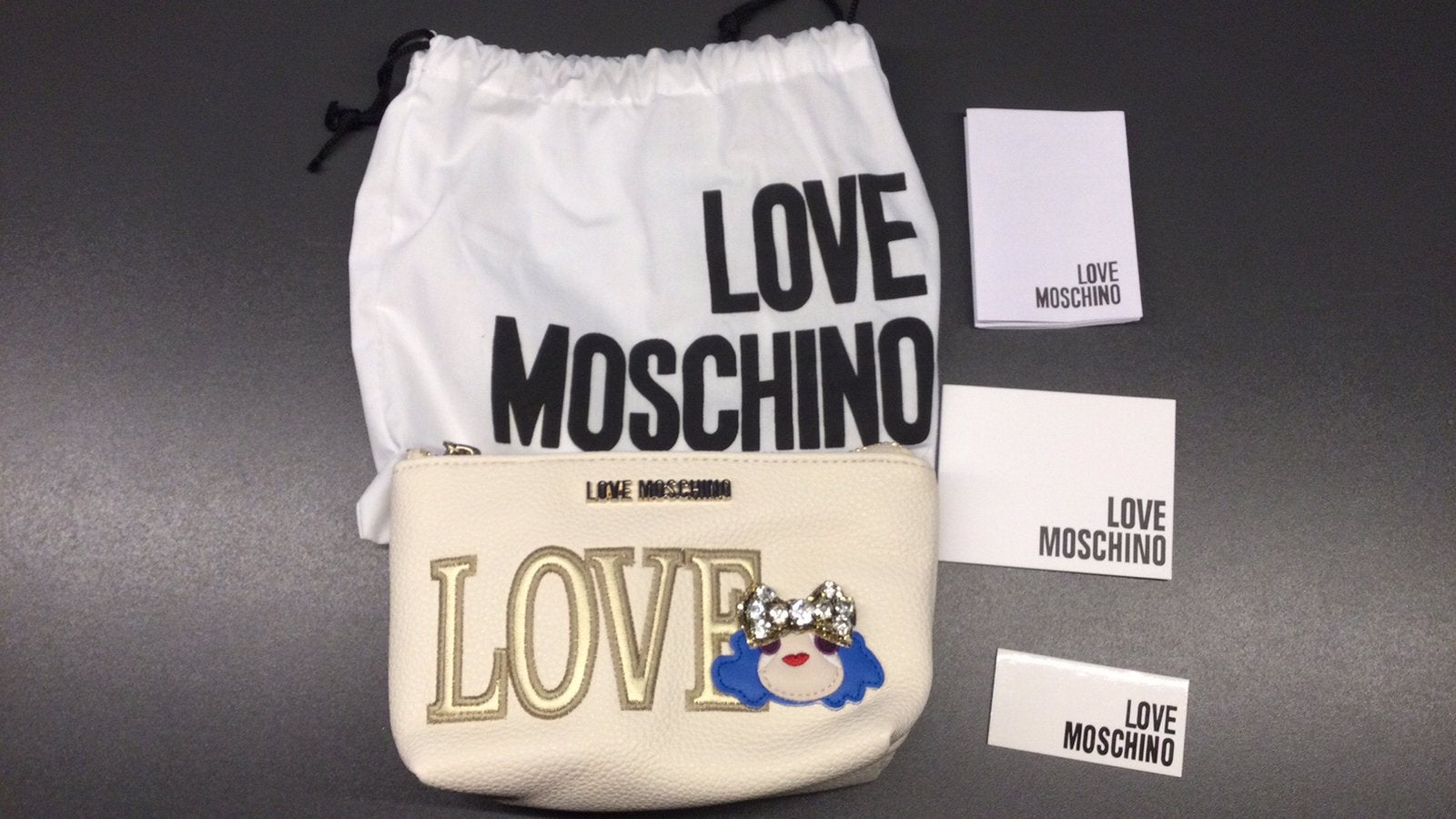 Love Moschino lederen toilettasje met strass nieuw, Ophalen of Verzenden, Nieuw, Dame