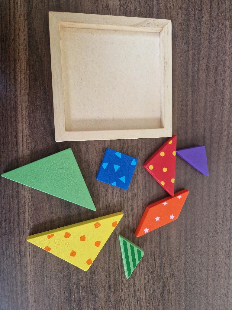 Tangram puzzel, 7 geometrische stukjes, Ophalen of Verzenden, Zo goed als nieuw, Puzzelen