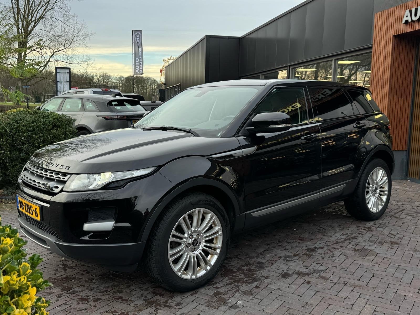 Land Rover Range Rover Evoque 2.0 Si 4WD Leer Nette auto, Auto's, Land Rover, Automaat, Euro 5, Zwart, 4 cilinders