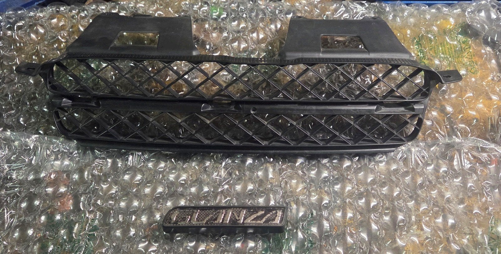 Toyota Starlet Glanza V 96 Spec Grille met logo, Gebruikt, Voor, Ophalen of Verzenden, Toyota
