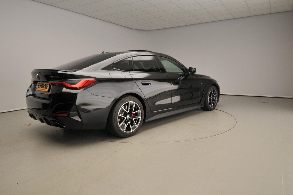 BMW 4 Serie Gran Coupé M440i xDrive M-Sportpakket | Laserli, Auto's, BMW, 12 maanden, 1800 kg, Zwart, Bedrijf