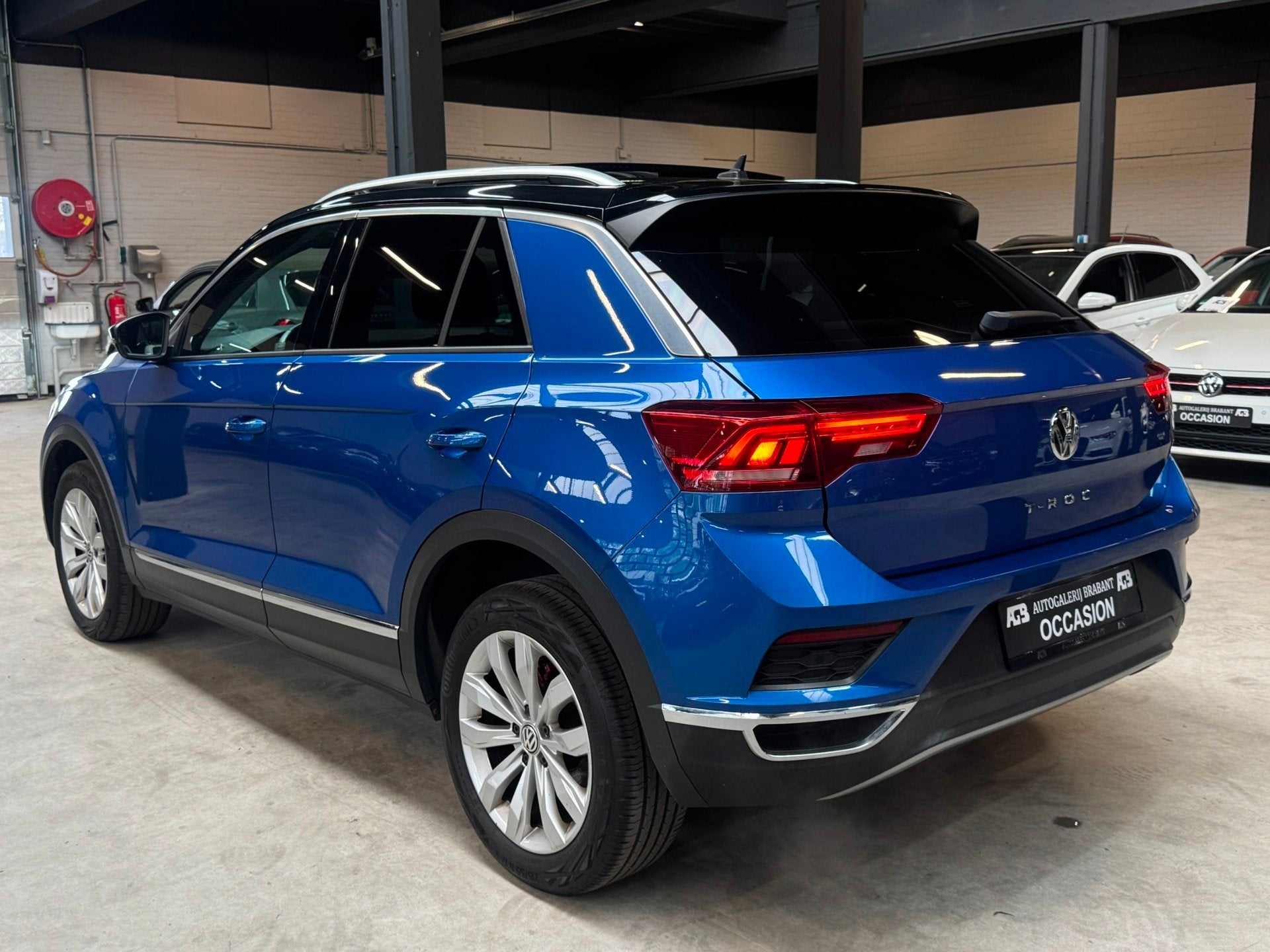 Volkswagen T-Roc 1.5 TSI Sport *Pano/Carplay/Stoelverwarming, Auto's, Euro 6, 4 cilinders, 150 pk, Blauw