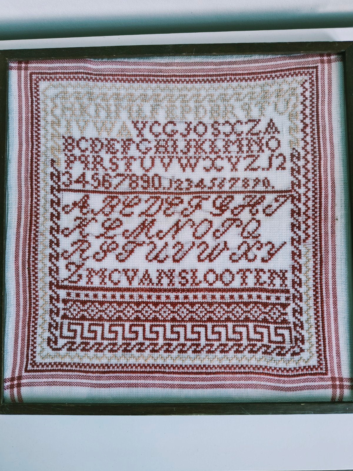Oude merklap, ingelijst., Antiek en Kunst, Curiosa en Brocante, Ophalen of Verzenden