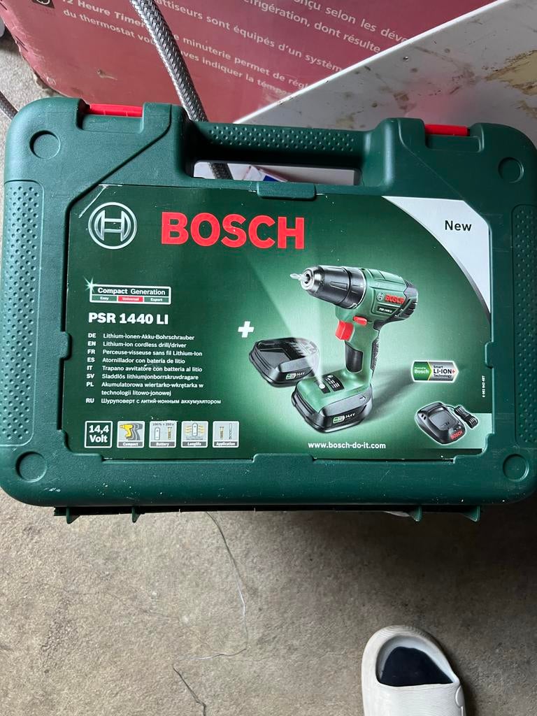 Bosch PSR 1440 LI Accuboormachine met 2 accu's en lader, Variabele snelheid, Nieuw, Ophalen of Verzenden, Boor- en Schroefmachine
