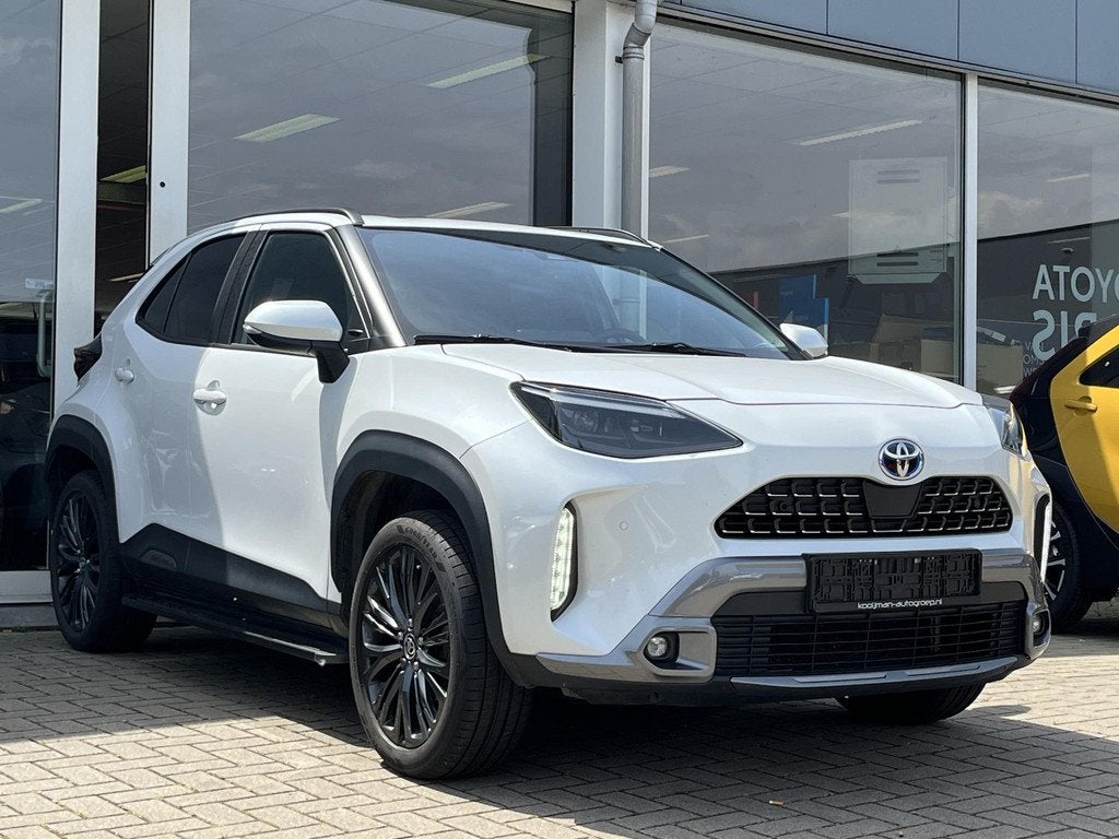 Toyota Yaris Cross 1.5 Hybrid AWD Adventure | Head up displa, Auto's, Toyota, Automaat, Gebruikt, Wit, 1490 cc