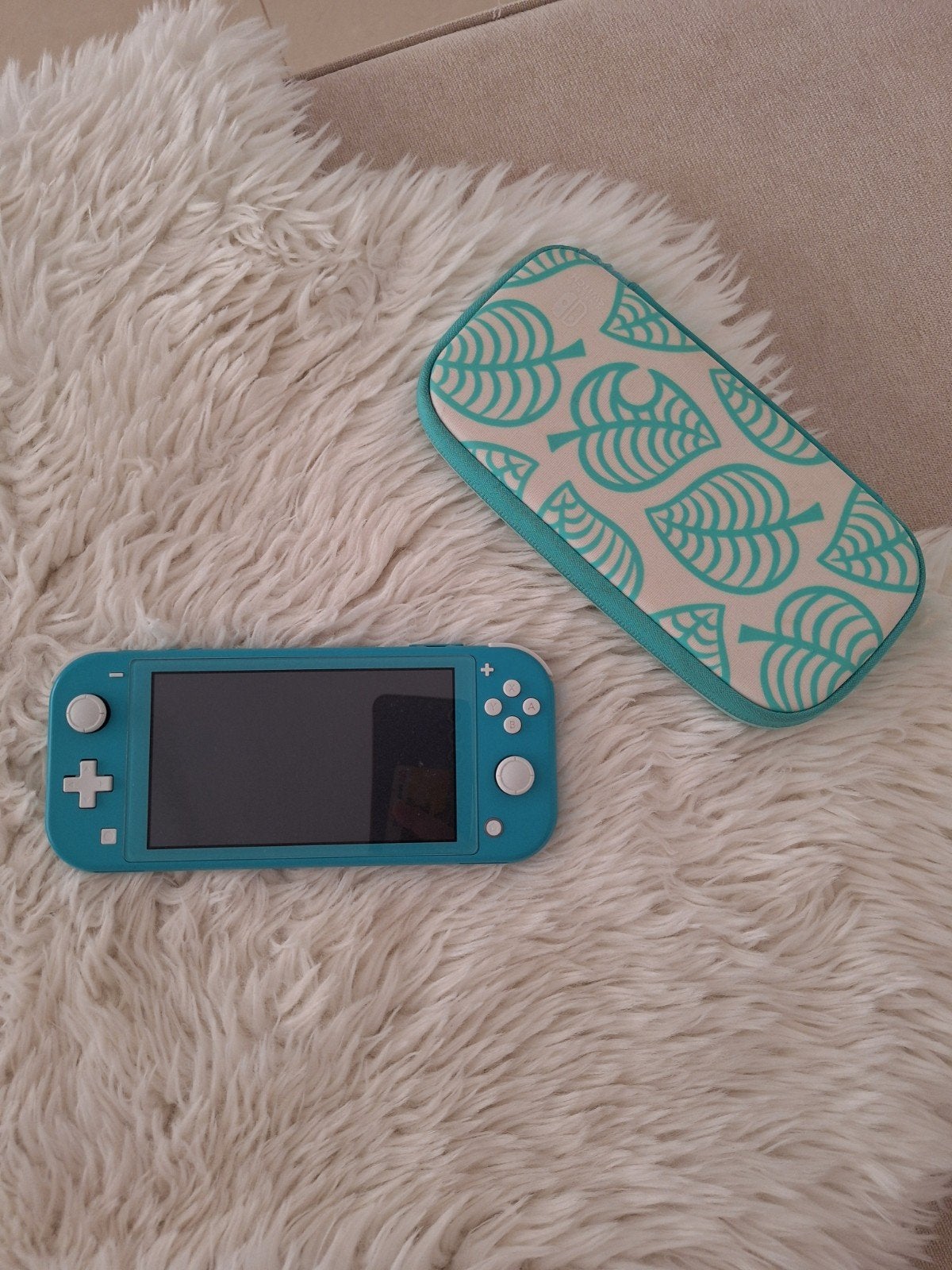 Nintendo Switch Lite Turquoise met protector en case, Spelcomputers en Games, Spelcomputers | Nintendo Switch Lite, Ophalen of Verzenden