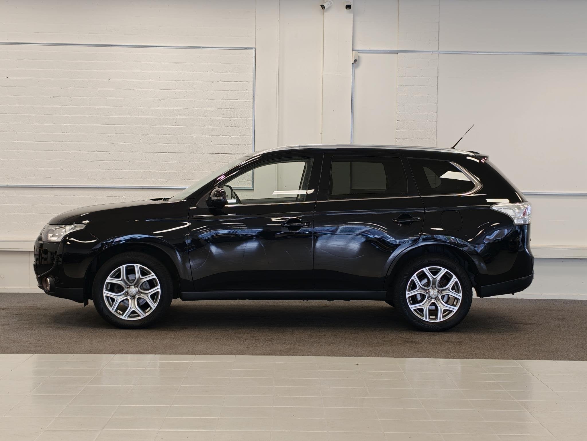 Mitsubishi Outlander 2.0i 16V Business Edition 7Pers. Allsea, Auto's, 4 cilinders, 150 pk, 7 stoelen, Zwart