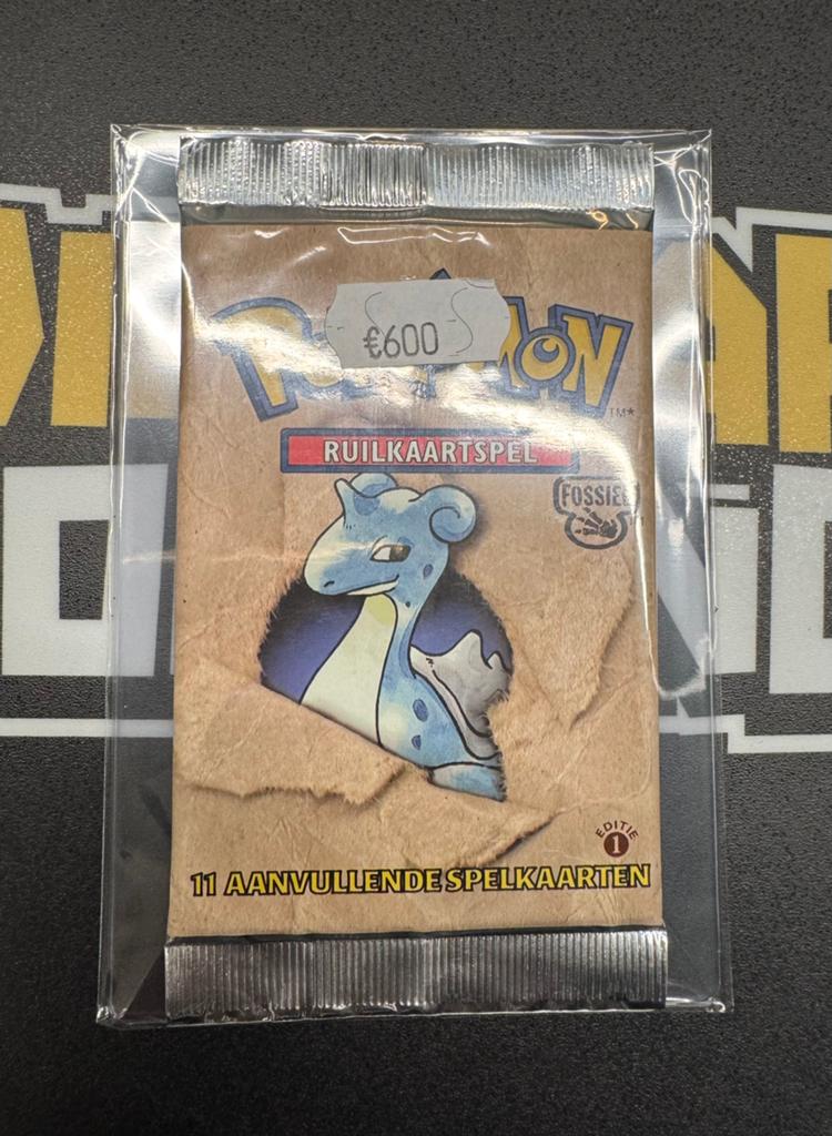 Pokemon 1st Edition Fossil GUARANTEED HEAVY NL Booster Pack, Ophalen of Verzenden, Zo goed als nieuw