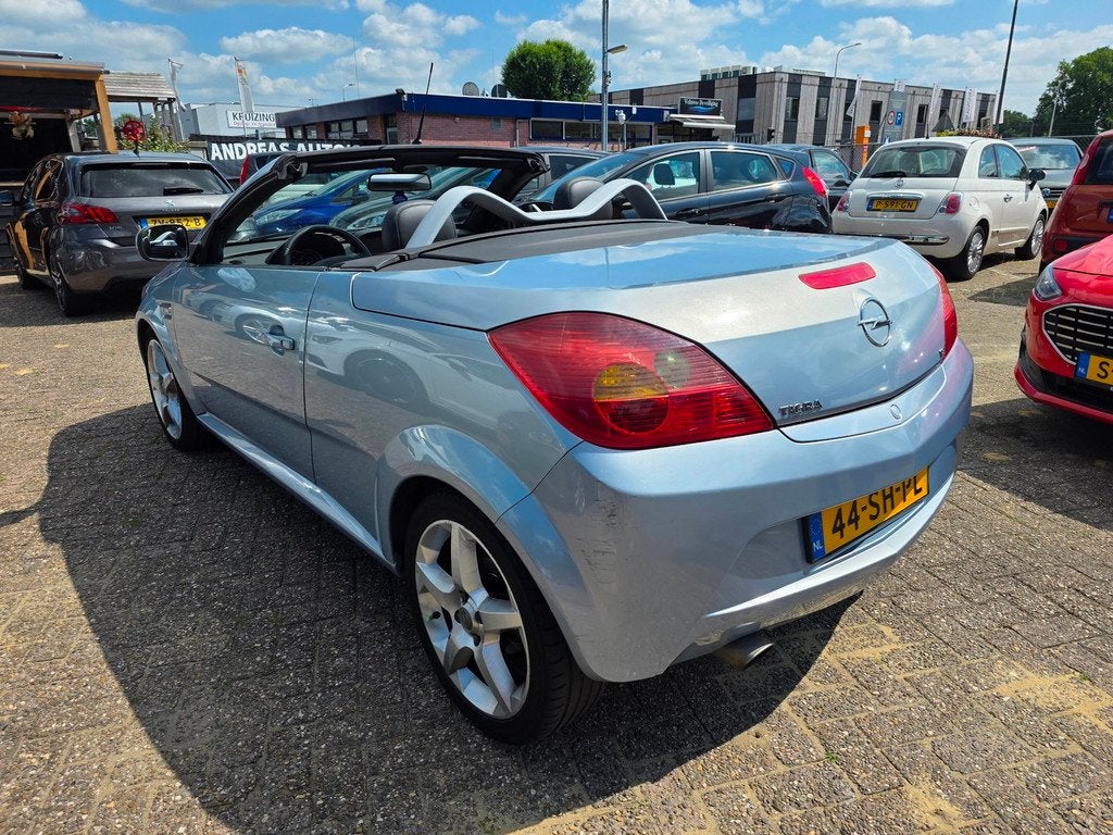 Opel Tigra TwinTop 1.8-16V Linea Rosso, Auto's, Opel, 125 pk, Gebruikt, 4 cilinders, Blauw