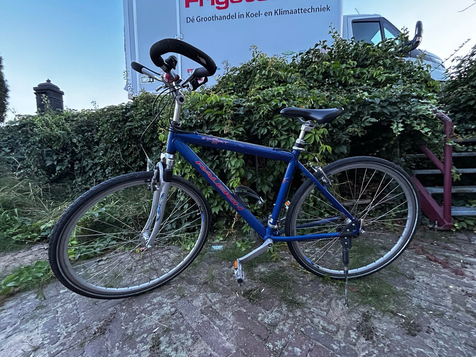 Raleigh fiets met vering en 21 versnellingen, Fietsen en Brommers, 28 inch, Gebruikt, Vering, Velgrem