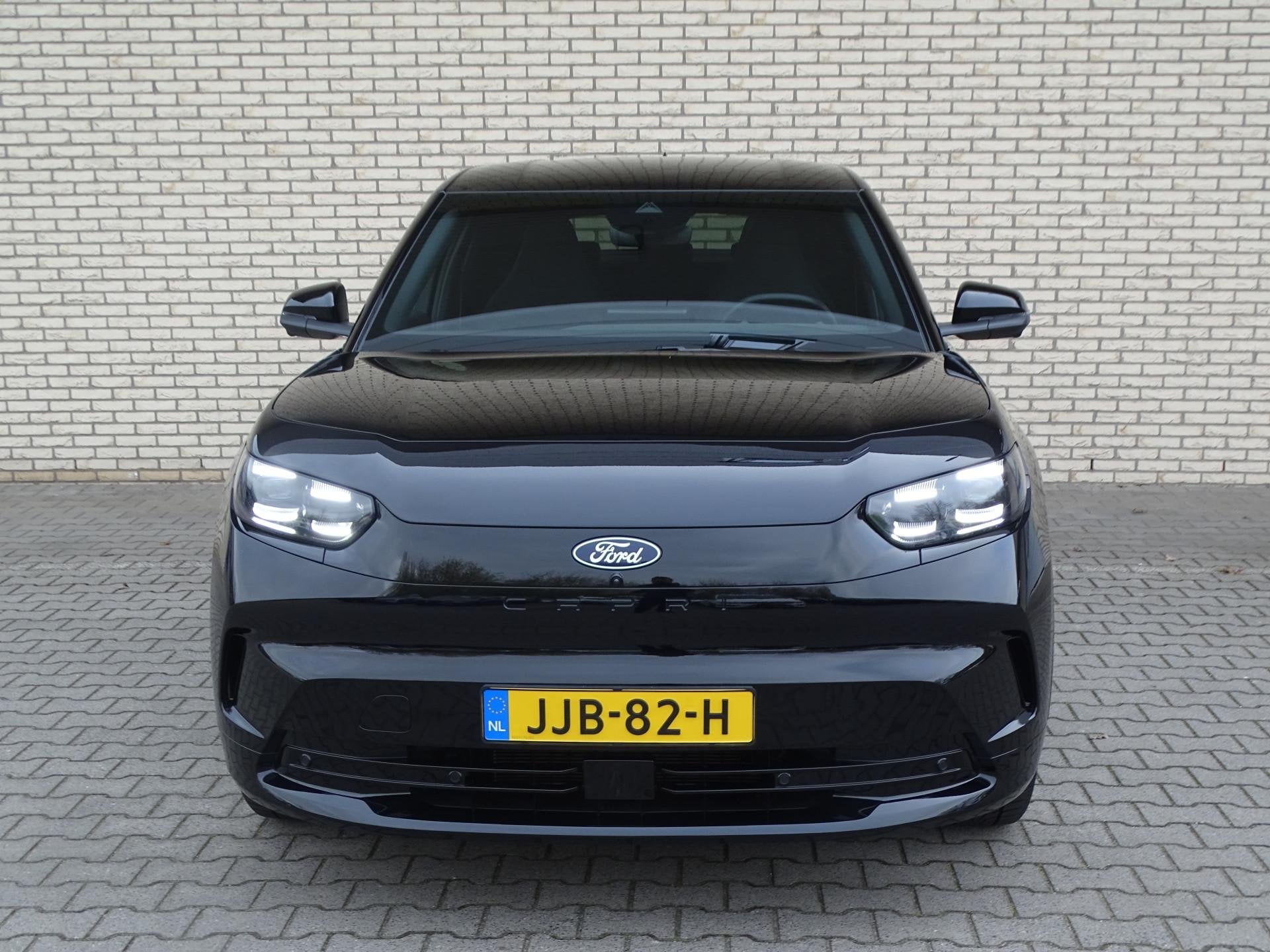 Ford Capri Premium Extended Range AWD 79 kWh | Driver Assist, Auto's, Automaat, 12 maanden, Stof, Gebruikt