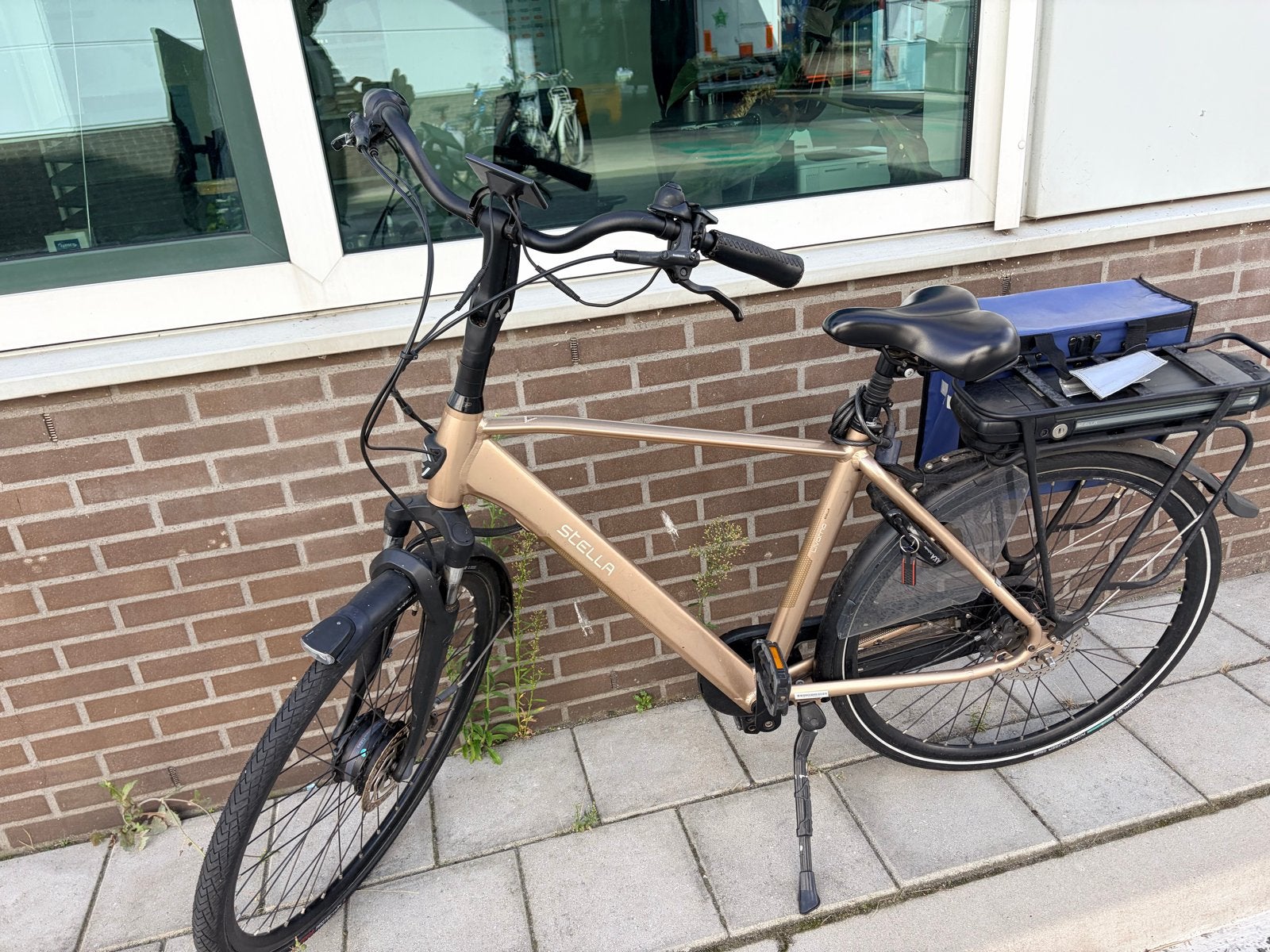 Stella e-bike, goudkleurig, met achterwielmotor, 51 tot 55 cm, Ophalen, Gebruikt, 50 km per accu of meer