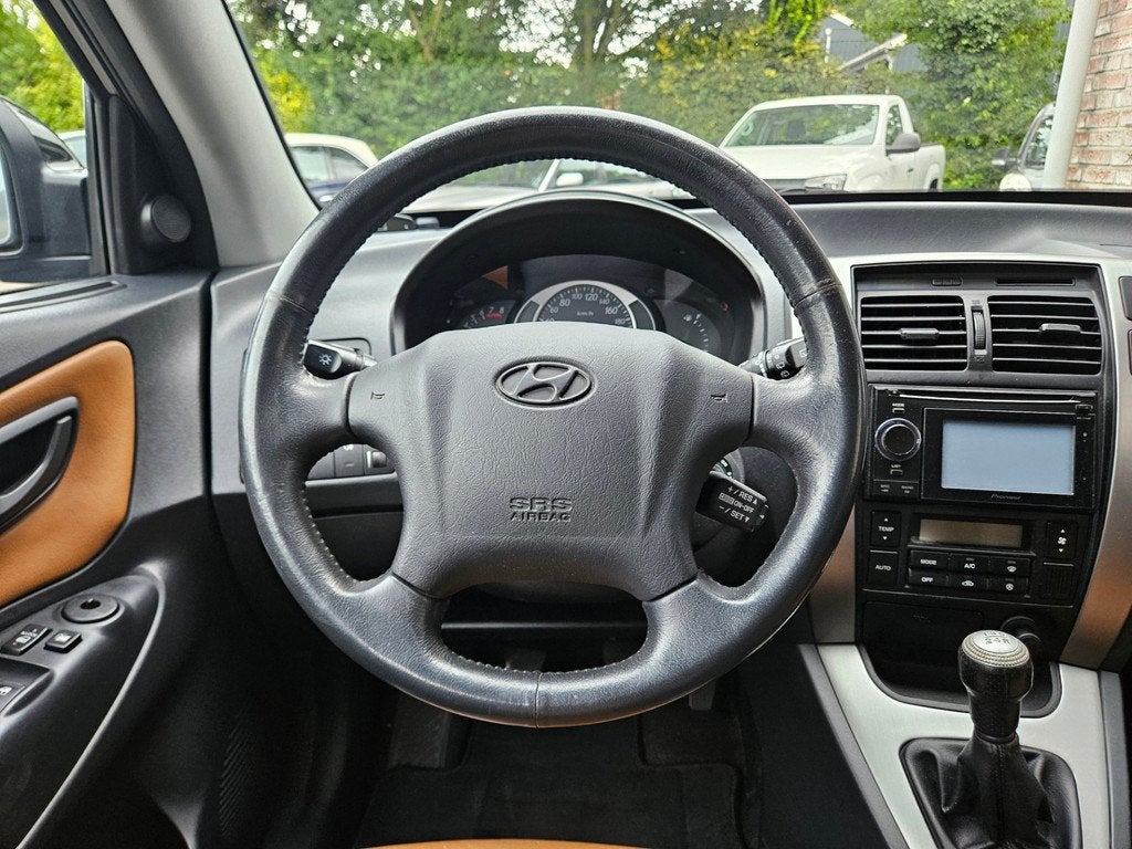 Hyundai Tucson 2.0i Style Trekhaak! Airco/Clima! Cruise Cont, Gebruikt, 4 cilinders, Zwart, Origineel Nederlands