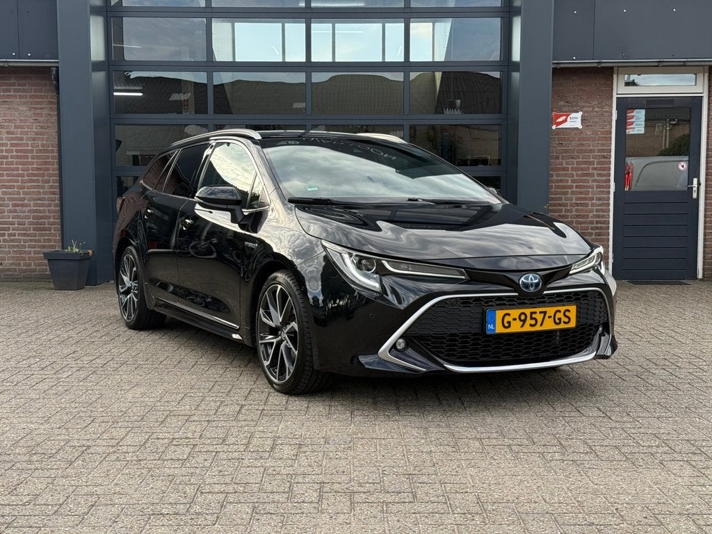 Toyota Corolla Touring Sports 2.0 Hybrid Executive N.A.P.!, 450 kg, Gebruikt, 4 cilinders, Zwart