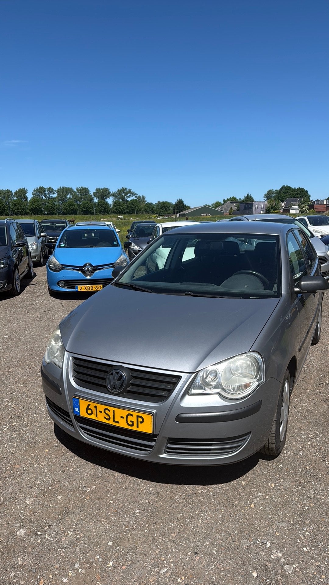 Volkswagen Polo 1.2 47KW 2006 Grijs, Auto's, Voorwielaandrijving, 540 kg, 1198 cc, Origineel Nederlands