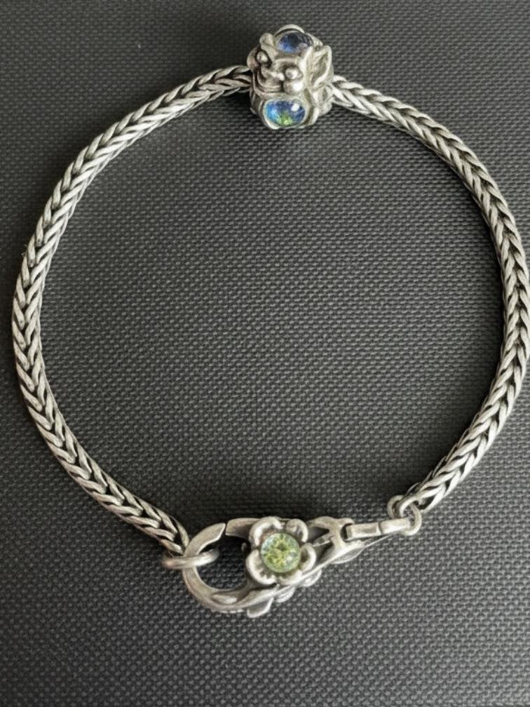 Zilveren trollbead armband met slot en bedel retired