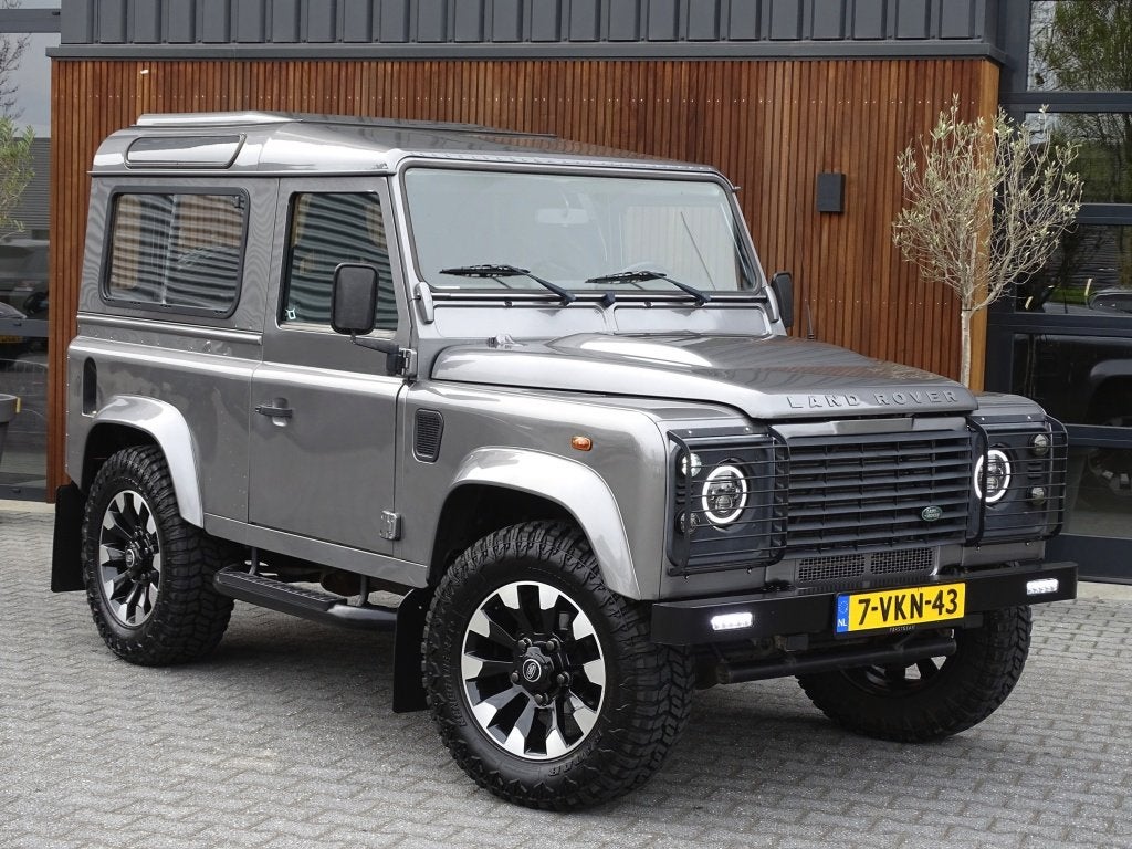 Land Rover Defender 2.4 TD4 HT 90" SE / Recaro / grijs kente, Auto's, Euro 5, Gebruikt, Zwart, Origineel Nederlands