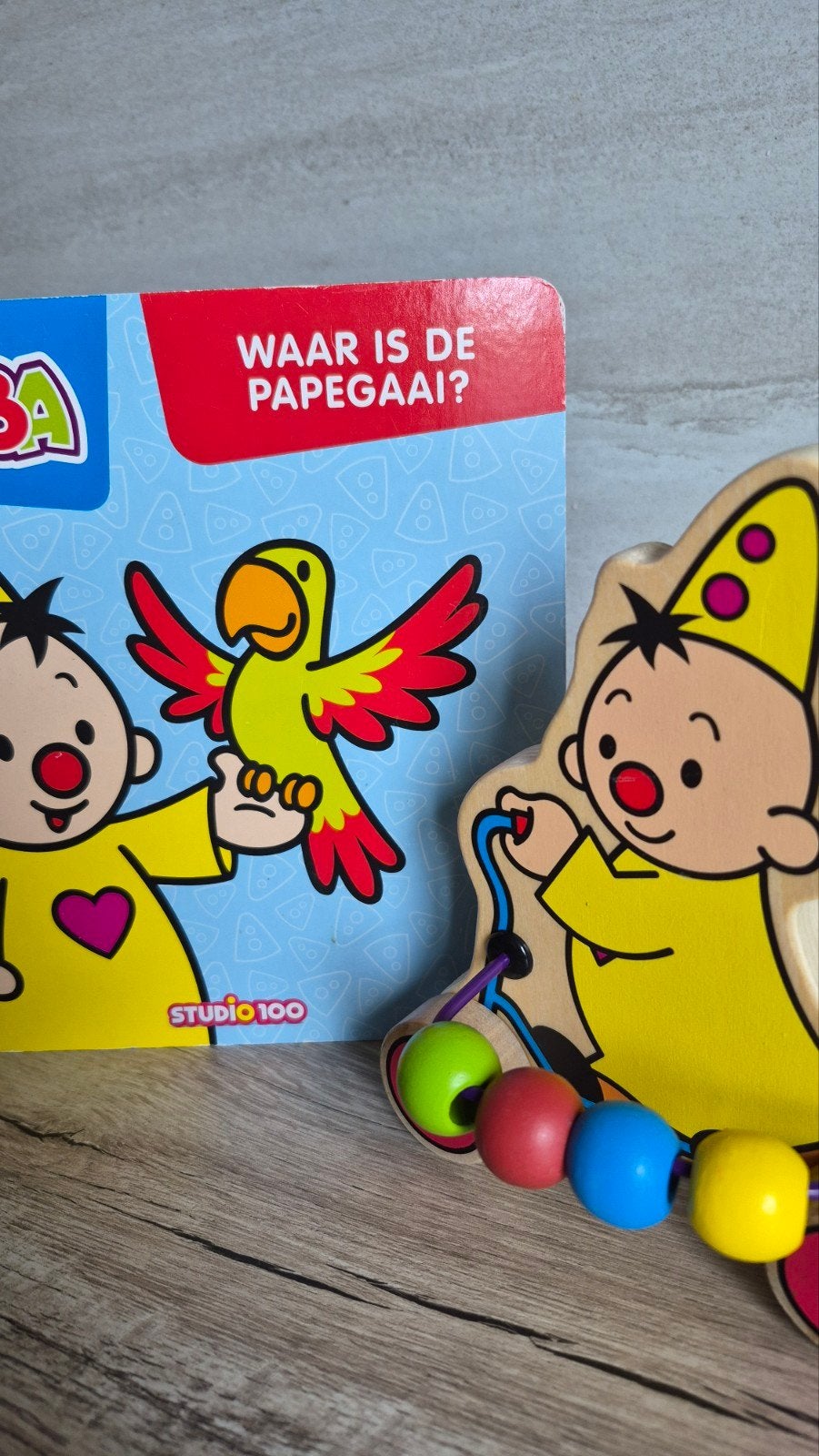 Bumba houten trekfiguur met kralen en boekje, Ophalen of Verzenden