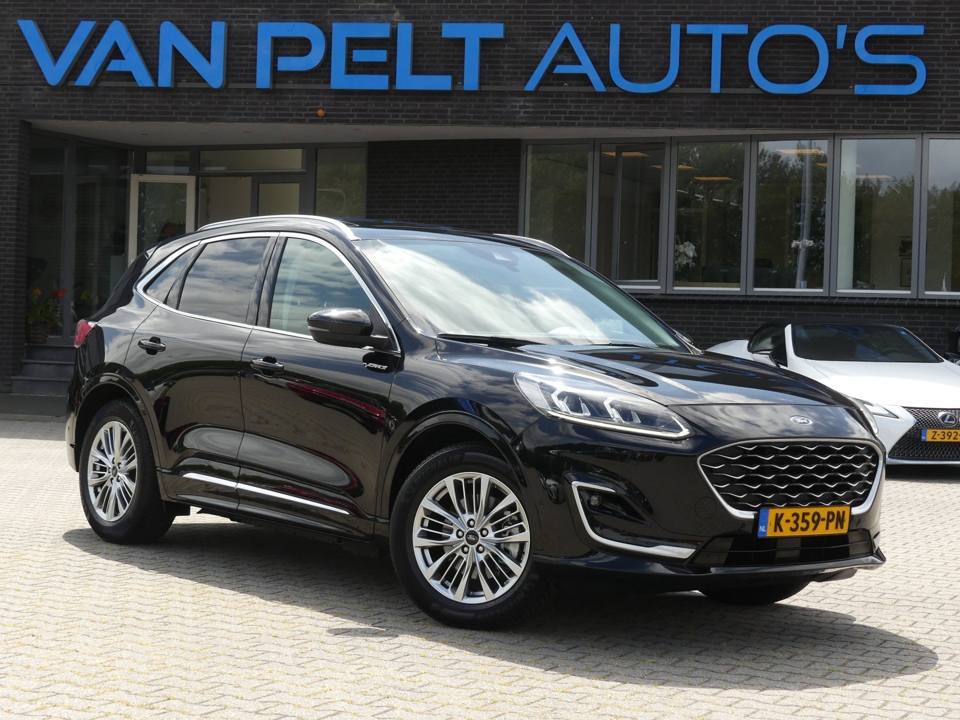 Ford Kuga 2.5 PHEV Vignale / Pano / H&K Audio / Winter, Auto's, 14 kWh, Gebruikt, 4 cilinders, Zwart