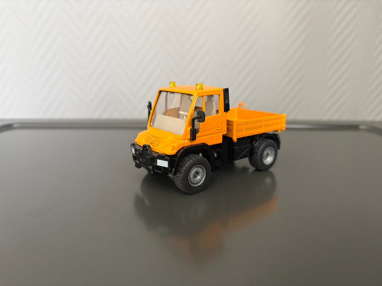 Unimog siku oranje, Ophalen of Verzenden, Zo goed als nieuw, Tractor of Landbouw, SIKU