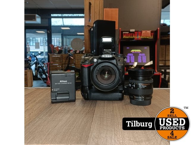 Nikon D7000 spiegelreflexcamera  AF-S Nikkor 35mm 1.1.8G, Audio, Tv en Foto, Fotocamera's Digitaal, Nikon, Zo goed als nieuw, Support@nikon.com