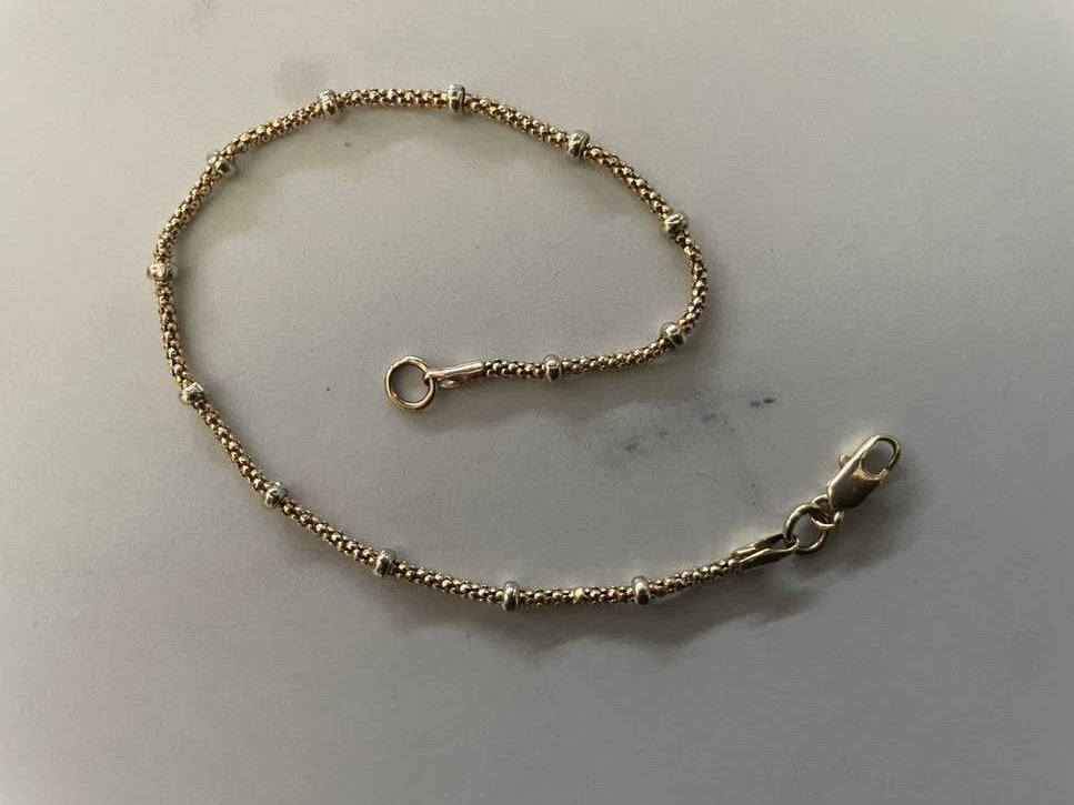 Gouden armband 14 karaat 19 cm bicolor (geel en wit goud), Gebruikt, Ophalen of Verzenden, Met bedels of kralen, Goud