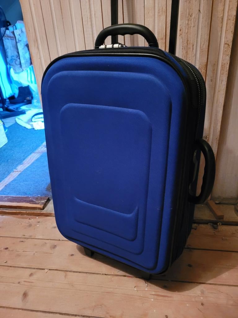 Blauwe reiskoffer met wieltjes en uitschuifbare handgreep, Ophalen, 40 tot 60 cm, Wieltjes, Gebruikt