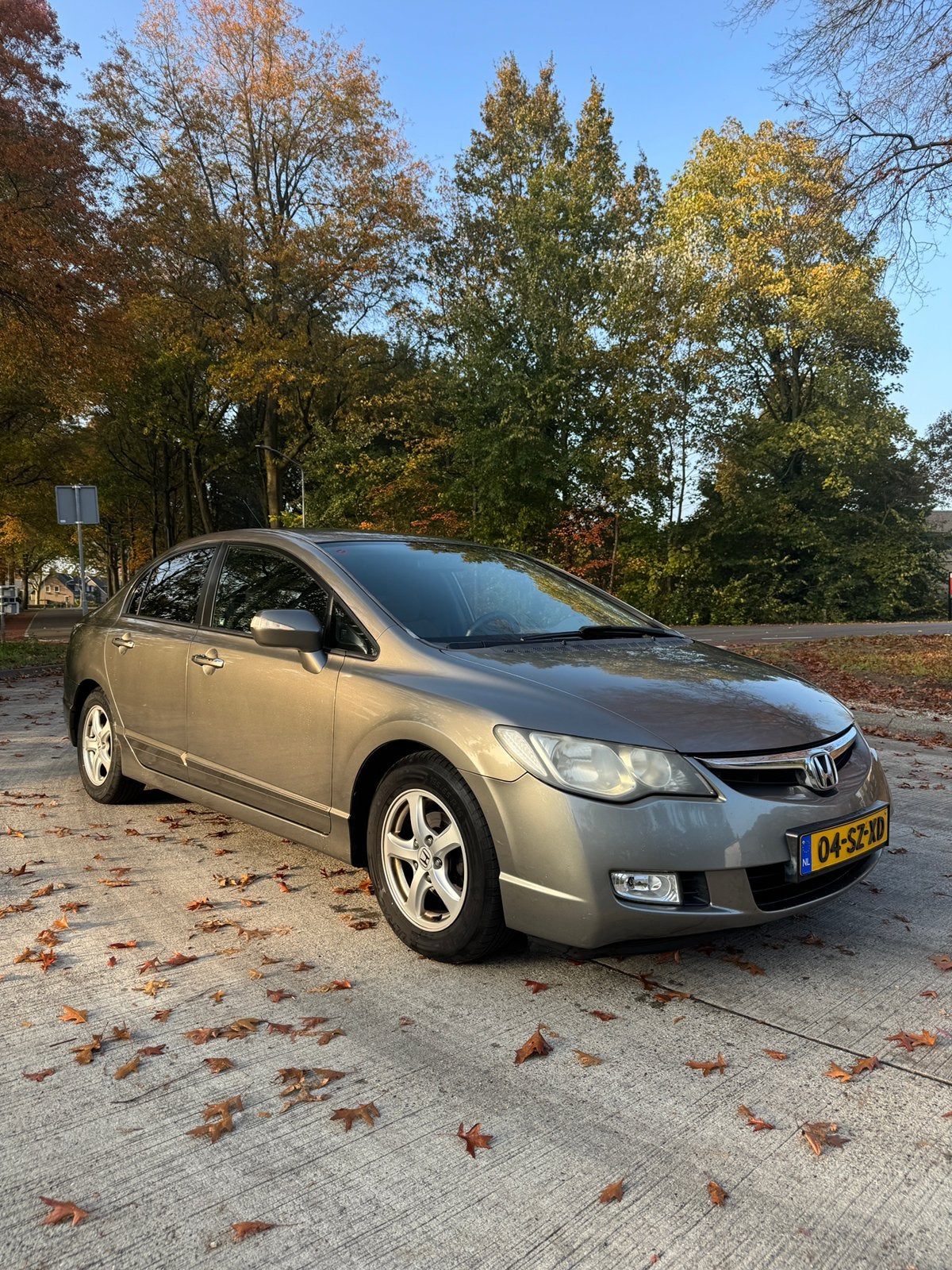 Honda Civic 1.3 Vtec Hybrid 4DR C-tr. 2006 Grijs, Auto's, Stoelverwarming, Beige, Origineel Nederlands, Grijs