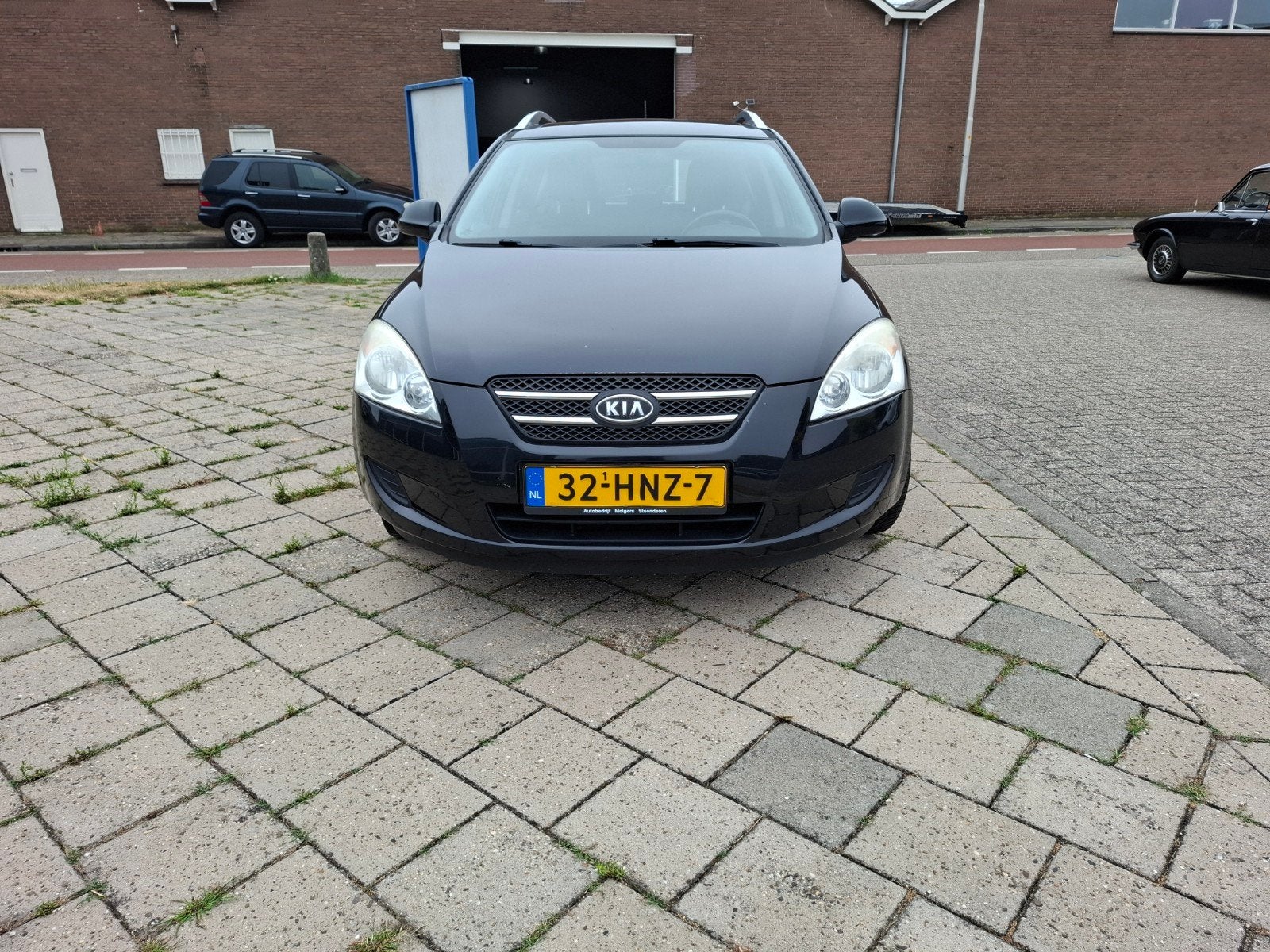 Kia (Pro) Cee d 1.4 Sporty Wagon 2009 Zwart Airco, Auto's, Voorwielaandrijving, 4 cilinders, 1396 cc, Zwart