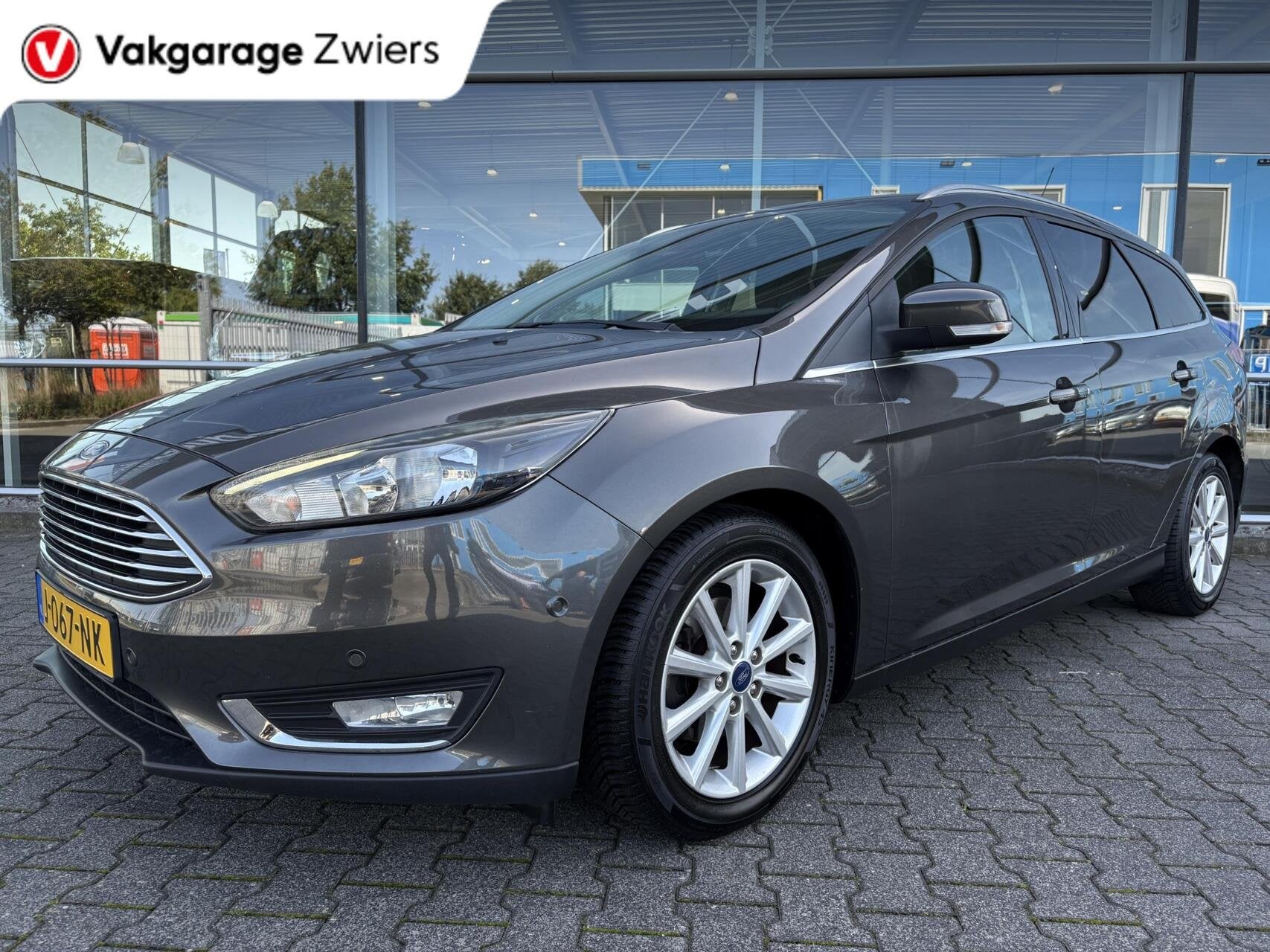 Ford Focus Wagon 1.0 Titanium|Stoel/stuur.verw|Navi|Afnm.tre, Auto's, 125 pk, Gebruikt, Euro 6, Automatische klimaatregeling