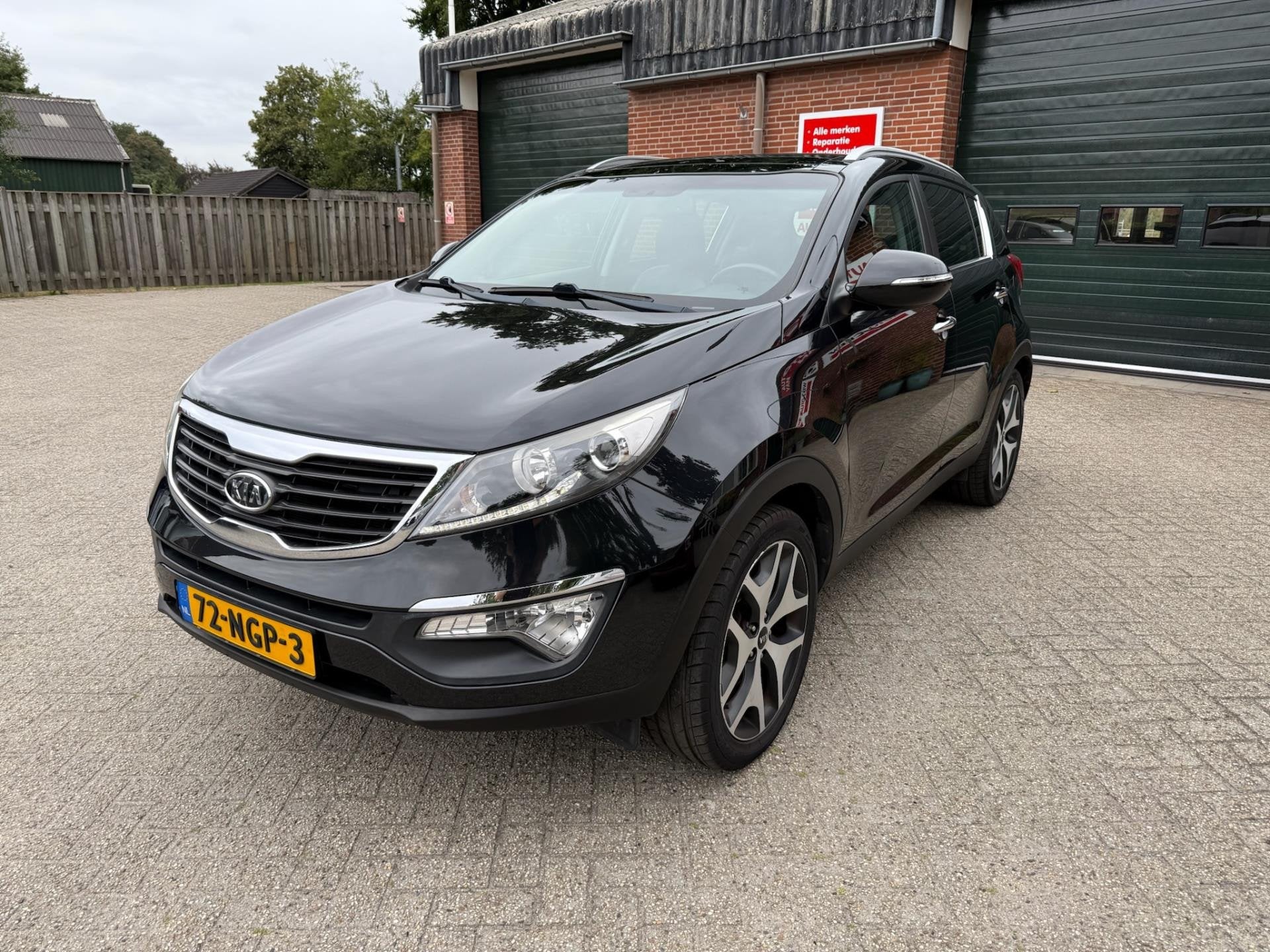 Kia Sportage 2.0 X-ecutive Plus Pack, Gebruikt, Zwart, 4 cilinders, Leder en Stof